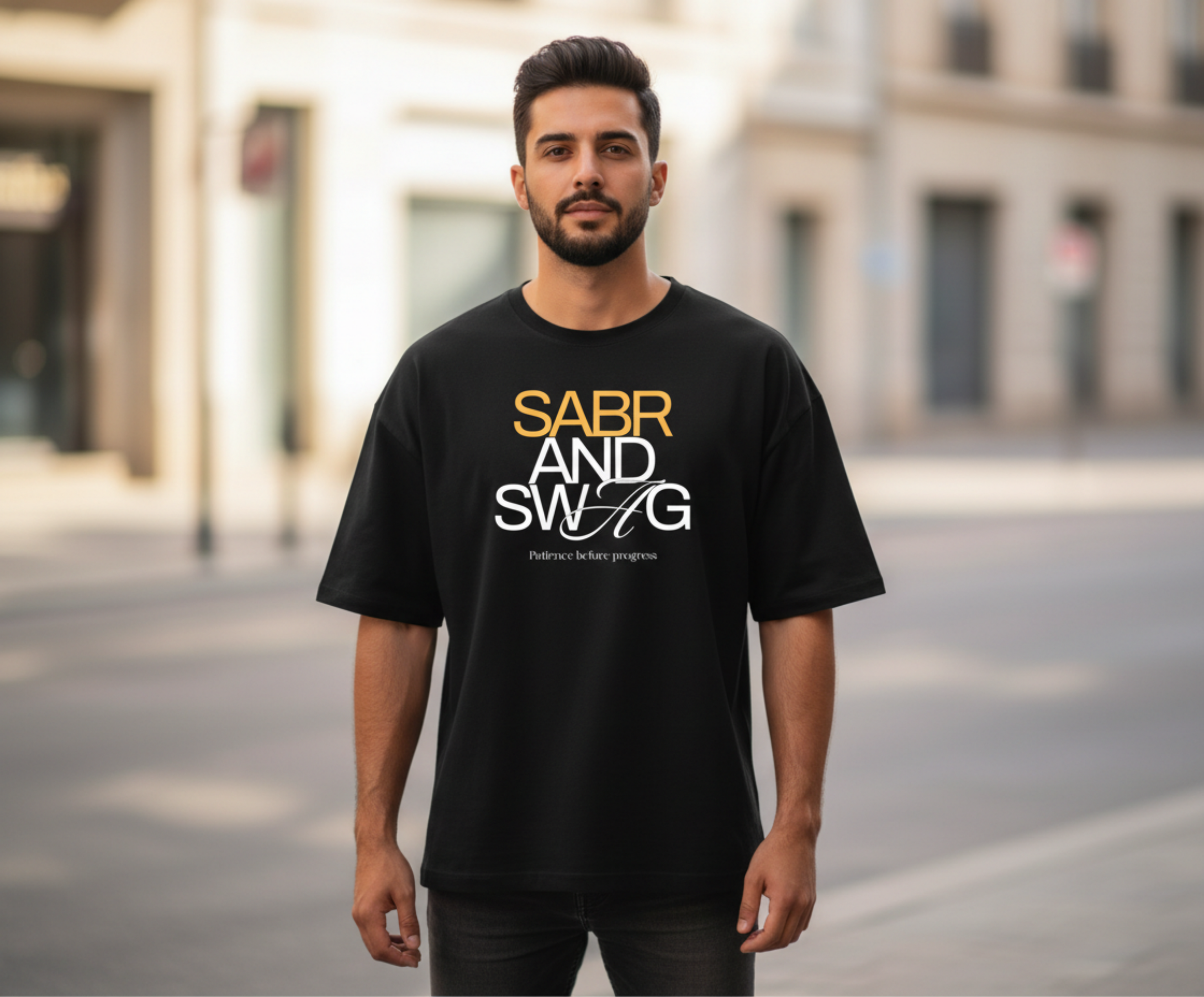 Man wearing a black t-shirt with 'SABR AND SWAG' text on a city street.